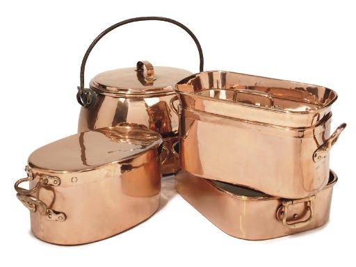 A collection of copper domestic utensils