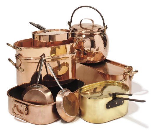 A composite copper and brass batterie de cuisine