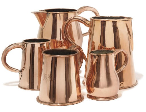 A Regency copper ale jug