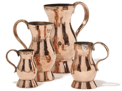 A SET OF FOUR COPPER SCOTTISH MEASURES