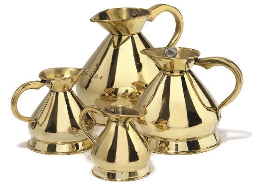 A RARE MATCHED SET OF FOUR BRASS IMPERIAL WINE MEASURES