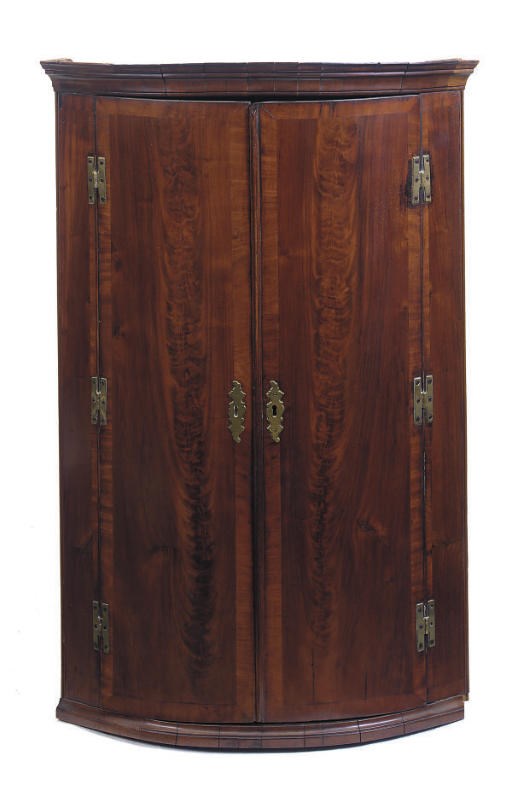 A MAHOGANY BOWFRONT HANGING CUPBOARD