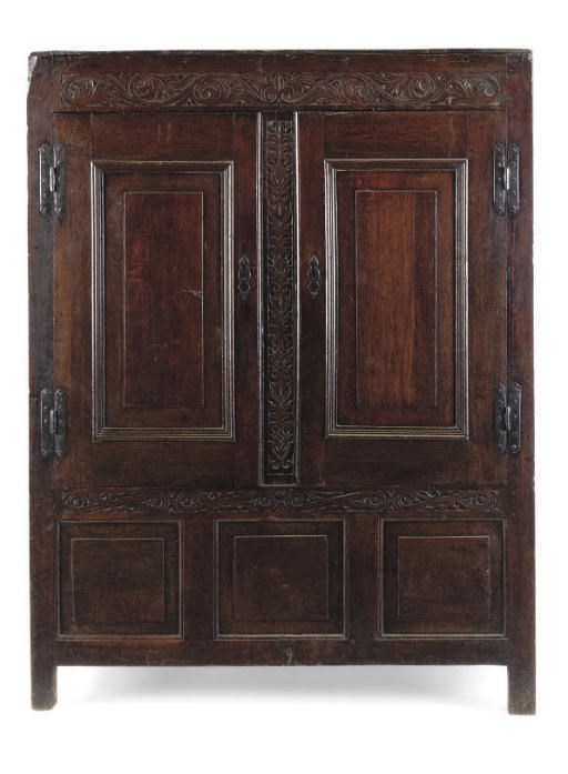 A NORTH COUNTRY OAK PRESS CUPBOARD