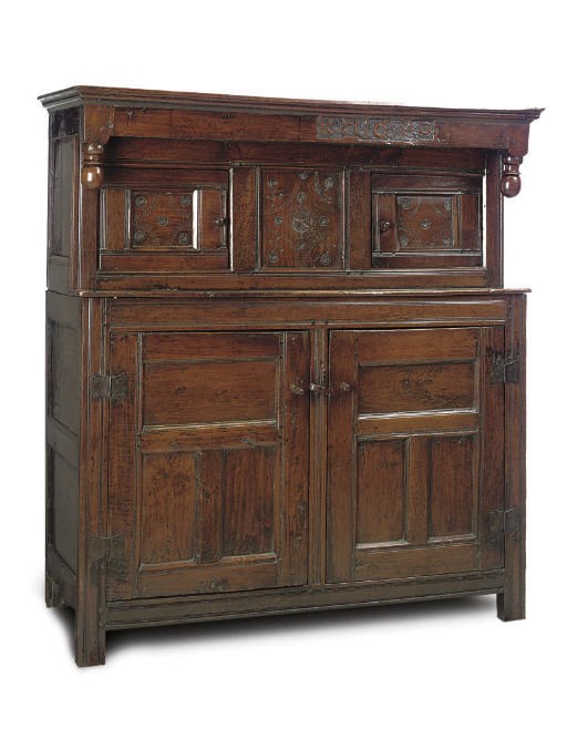 AN OAK PRESS CUPBOARD