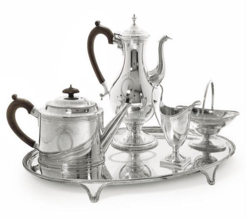 A MODERN SILVER 4-PIECE TEA & COFFEE SET WITH OVAL TRAY EN SUITE