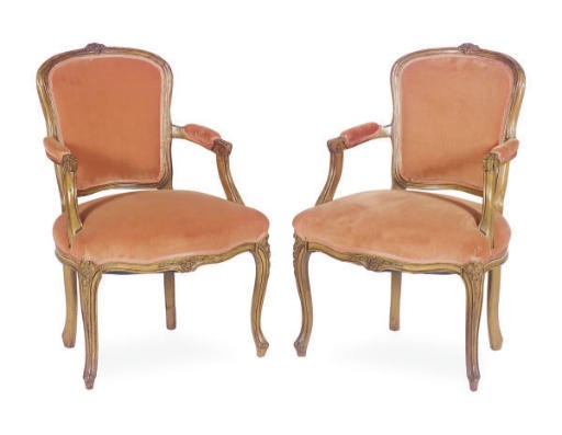 A PAIR OF FRUITWOOD AND UPHOLSTERED FAUTEUILS,