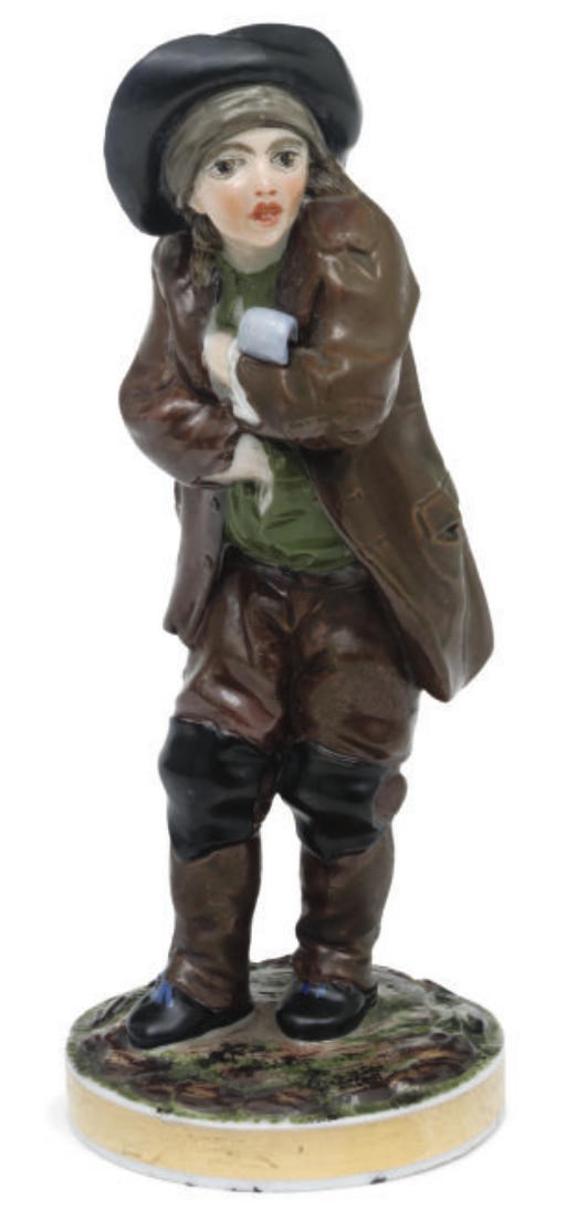 A RUSSIAN PORCELAIN FIGURE OF A BOY