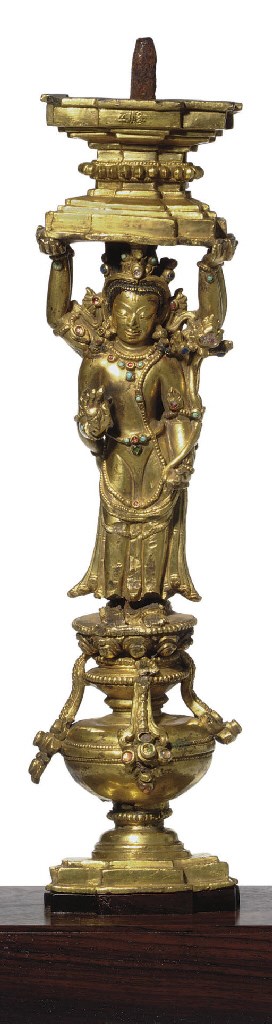 A gilt bronze support