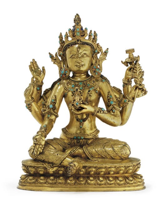 A gilt bronze figure of Vasudhara