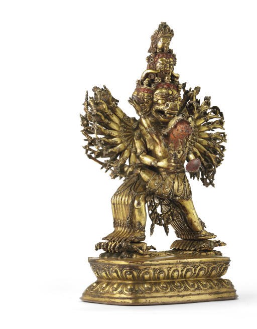 A large gilt bronze figure of Yamantaka