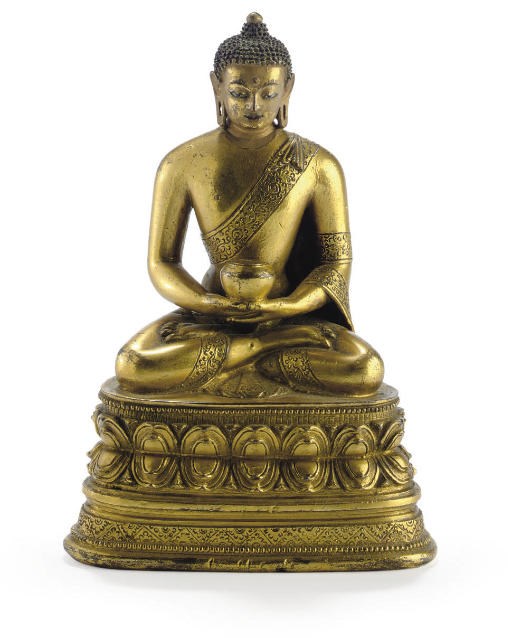 A gilt bronze figure of Buddha