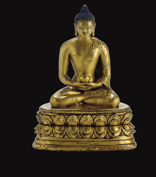 A gilt bronze figure of Buddha