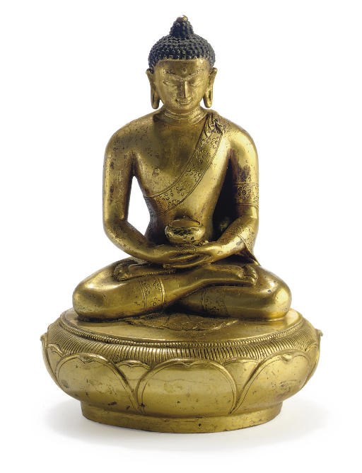 A gilt bronze figure of Buddha