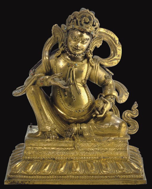 A gilt bronze figure of Kubera