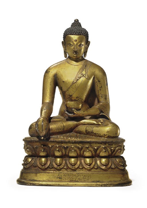 A gilt bronze figure of the Medicine Buddha