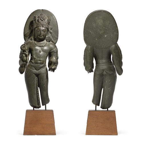 A rare green stone figure of Vishnu