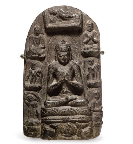 A small stone stele of Buddha with scenes from his life