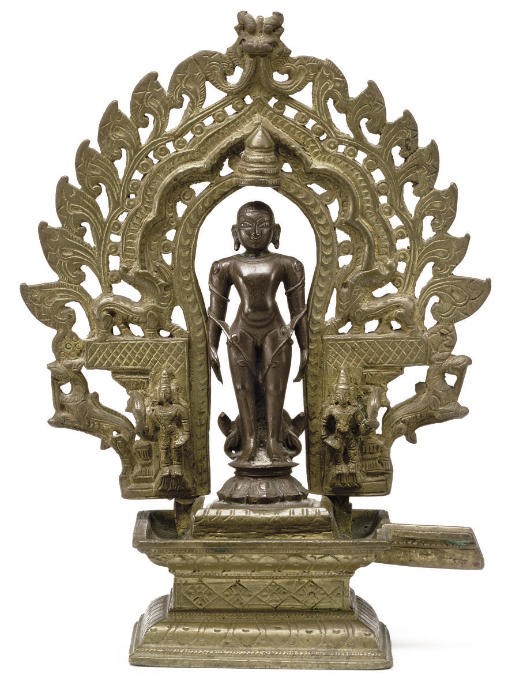 A copper and brass figure of Bahubali