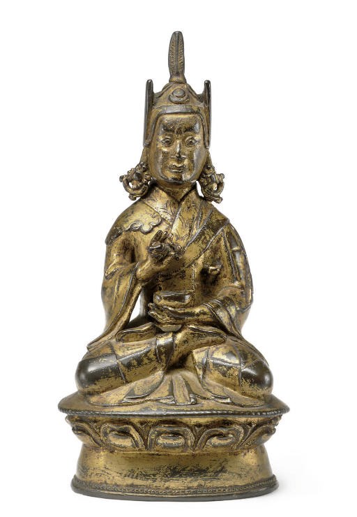 A gilt bronze figure of Padmasambhava