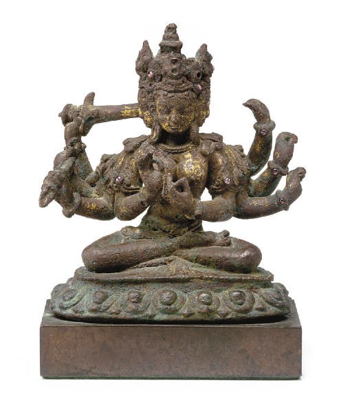 A copper figure of a Devi