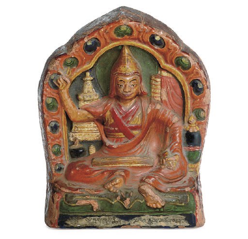 A polychromed terracotta tsa tsa of Lama Namkha Gyaltsen