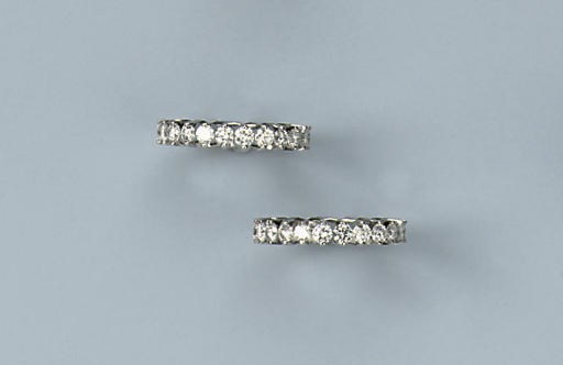 A PAIR OF DIAMOND ETERNITY RINGS