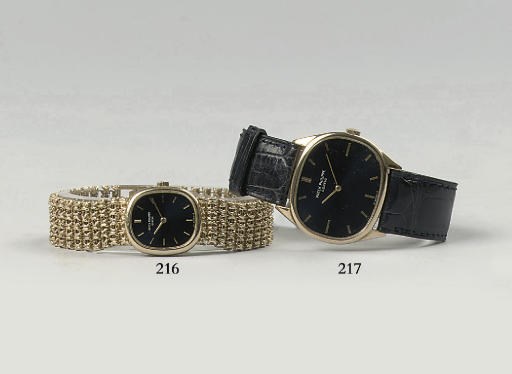 AN 18K GOLD LADY'S OVAL WRISTWATCH, BY PATEK PHILIPPE