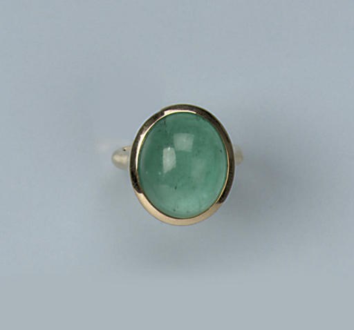 AN EMERALD RING
