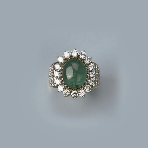 AN EMERALD AND DIAMOND DRESS RING