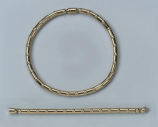 A TUBULAR GOLD NECKLACE/BRACELET BY CHOPARD