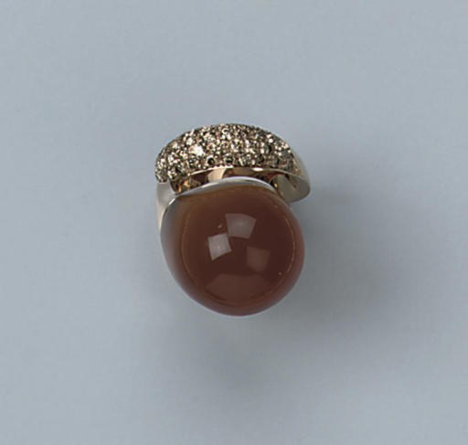 A FIRE OPAL AND COLOURED DIAMOND RING