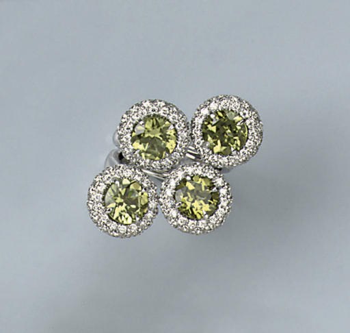 A PERIDOT AND DIAMOND DRESS RING