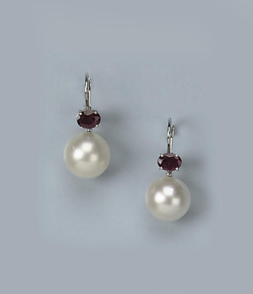 A PAIR OF SOUTH SEA CULTURED PEARL AND RUBY EARRINGS