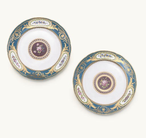 TWO SEVRES BLEU CELESTE-GROUND PLATES FROM THE SERVICE GIVEN BY LOUIS XVI TO ARCHDUKE FERDINAND OF AUSTRIA (ASSIETTES 'UNIE')