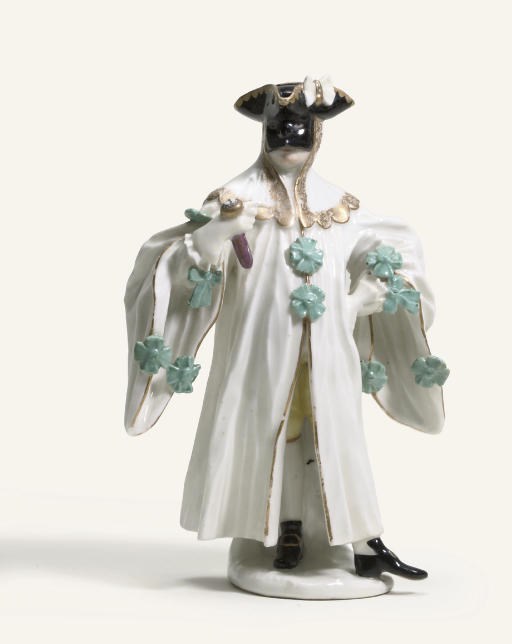 A MEISSEN FIGURE OF A MASQUERADER, TRADITIONALLY KNOWN AS AVVOCATO OR THE LAWYER FROM THE COMMEDIA DELL'ARTE SERIES