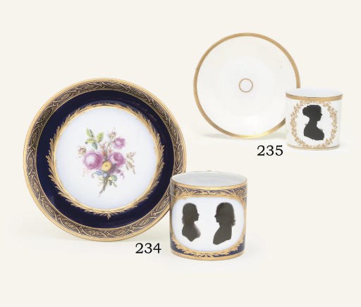 A CONTINENTAL PORCELAIN SILHOUETTE COFFEE-CUP AND A SAUCER