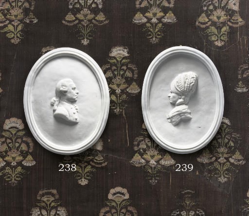 A VOLKSTEDT WHITE OVAL PORTRAIT MEDALLION
