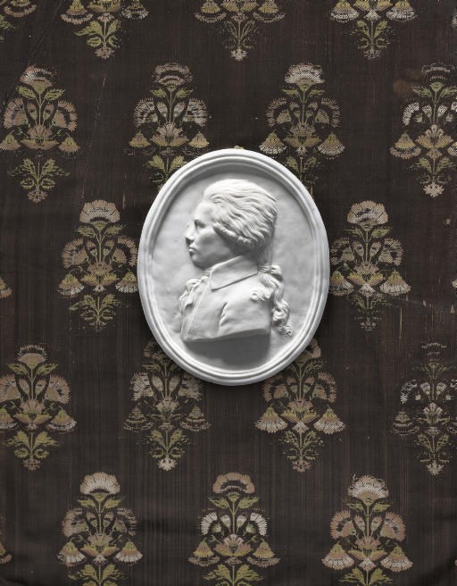 A VOLKSTEDT WHITE OVAL PORTRAIT MEDALLION