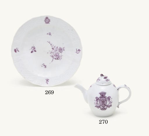 A VOLKSTEDT BULLET-SHAPED ARMORIAL TEAPOT AND A COVER