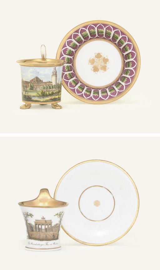 A MEISSEN TOPOGRAPHICAL CABINET-CUP AND SAUCER AND A BERLIN TOPOGRAPHICAL CABINET-CUP AND SAUCER