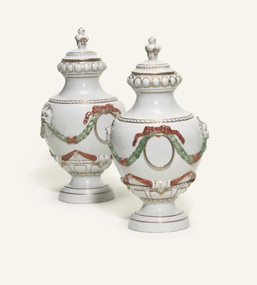 A PAIR OF GERA URN-SHAPED VASES AND COVERS