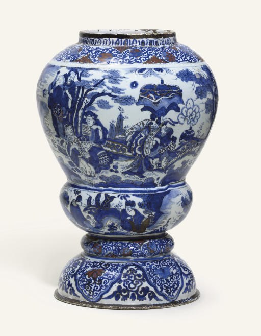 A BERLIN (FUNCKE) FAYENCE BLUE AND WHITE BALUSTER VASE