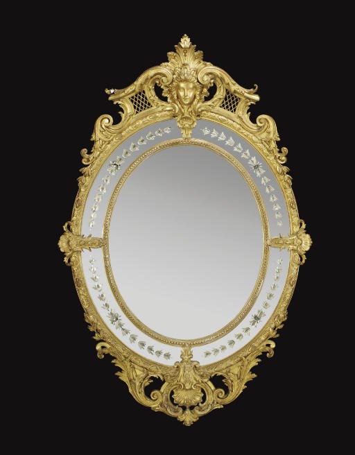A GILTWOOD OVER-MANTEL MIRROR