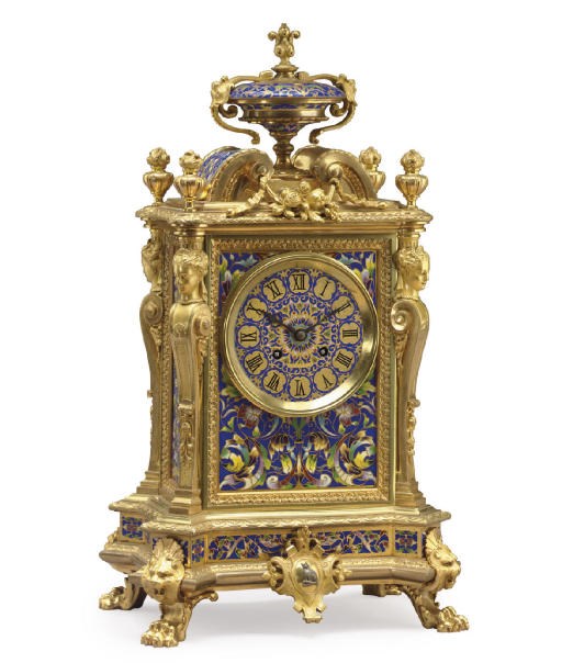 A FRENCH ORMOLU AND CHAMPLEVE ENAMEL MANTEL CLOCK