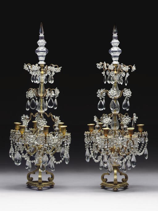 A PAIR OF GILT-METAL AND CUT-GLASS SIX-LIGHT GIRANDOLES