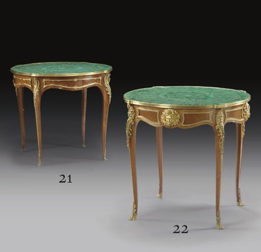 A FRENCH ORMOLU-MOUNTED KINGWOOD CENTRE-TABLE