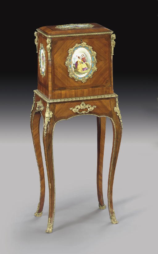 A NAPOLEON III ORMOLU- AND SEVRES STYLE PORCELAIN-MOUNTED MAHOGANY JEWELLRY CASKET**