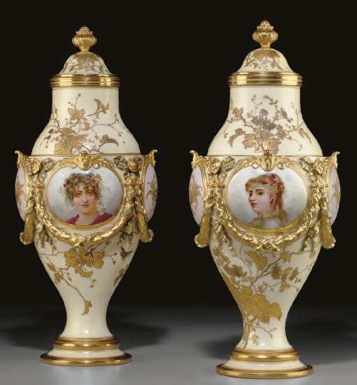 A PAIR OF CONTINENTAL IVORY-GROUND PORTRAIT VASES AND COVERS