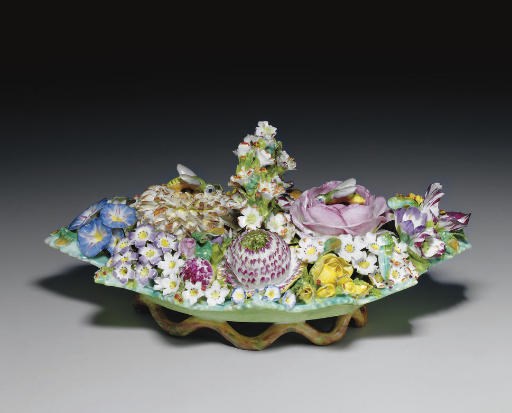 A MEISSEN-STYLE FLOWER-ENCRUSTED TROMPE L'OEIL INKSTAND AND TWO COVERS