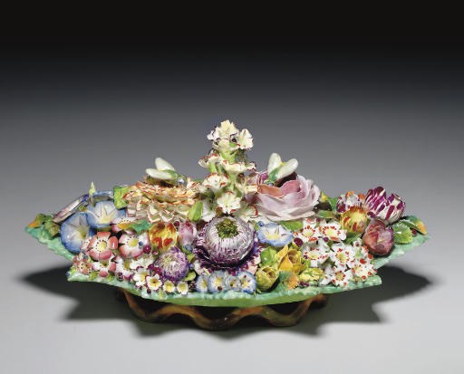 A MEISSEN STYLE TROMPE L'OEIL FLOWER-ENCRUSTED INKSTAND AND TWO COVERS